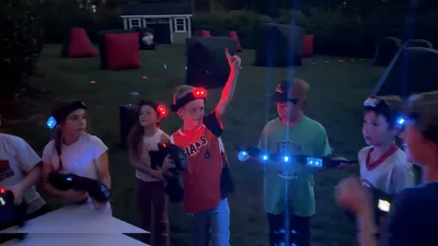 Children at an outdoor laser tag birthday party in the Philadelphia suburbs