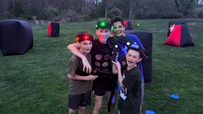 Four teens celebrating after a mobile laser tag birthday party game in West Chester, PA