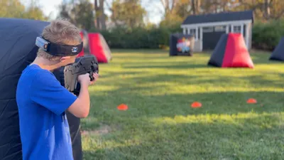 Kids competing in an outdoor laser tag game in Wilmington, DE